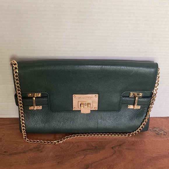 MICHAEL KORS LEADER CLUTCH  BAG